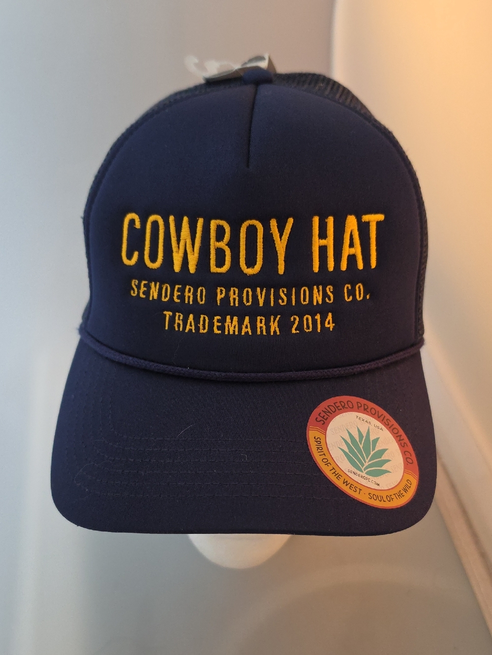 Sendero Provisions Co. Navy Trucker Hat with Yellow Embroidery
